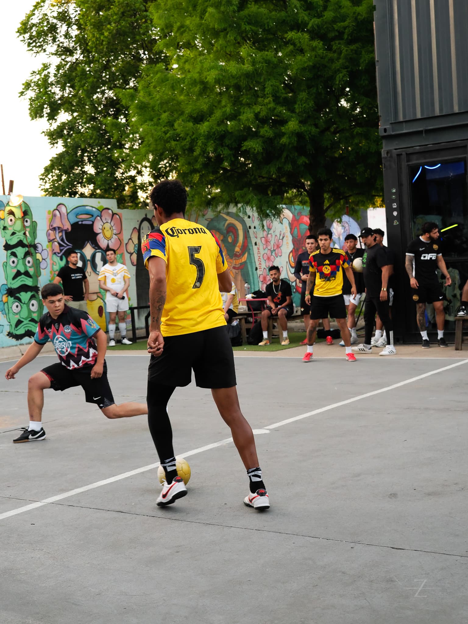 Striped-jersey player on the court